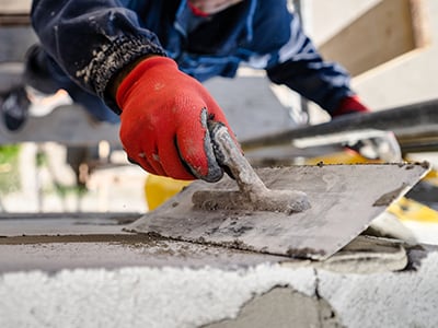 Worker using Masonry Supplies
